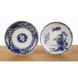Two blue and white Arita dishes Japanese the first painted with houses under a tree, with a