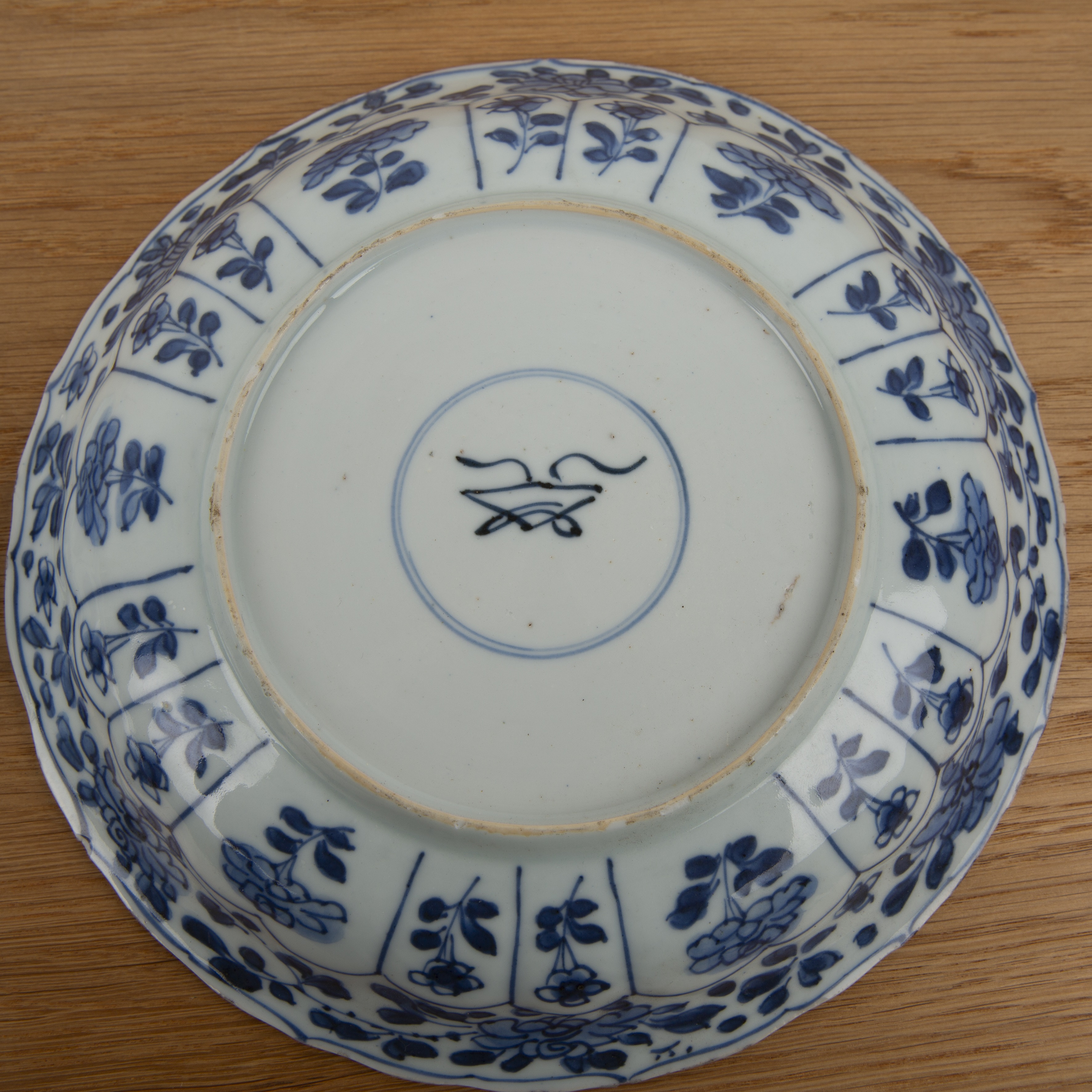 Two blue and white porcelain shallow dishes Chinese, Kangxi each of fluted form with panels of - Image 3 of 3