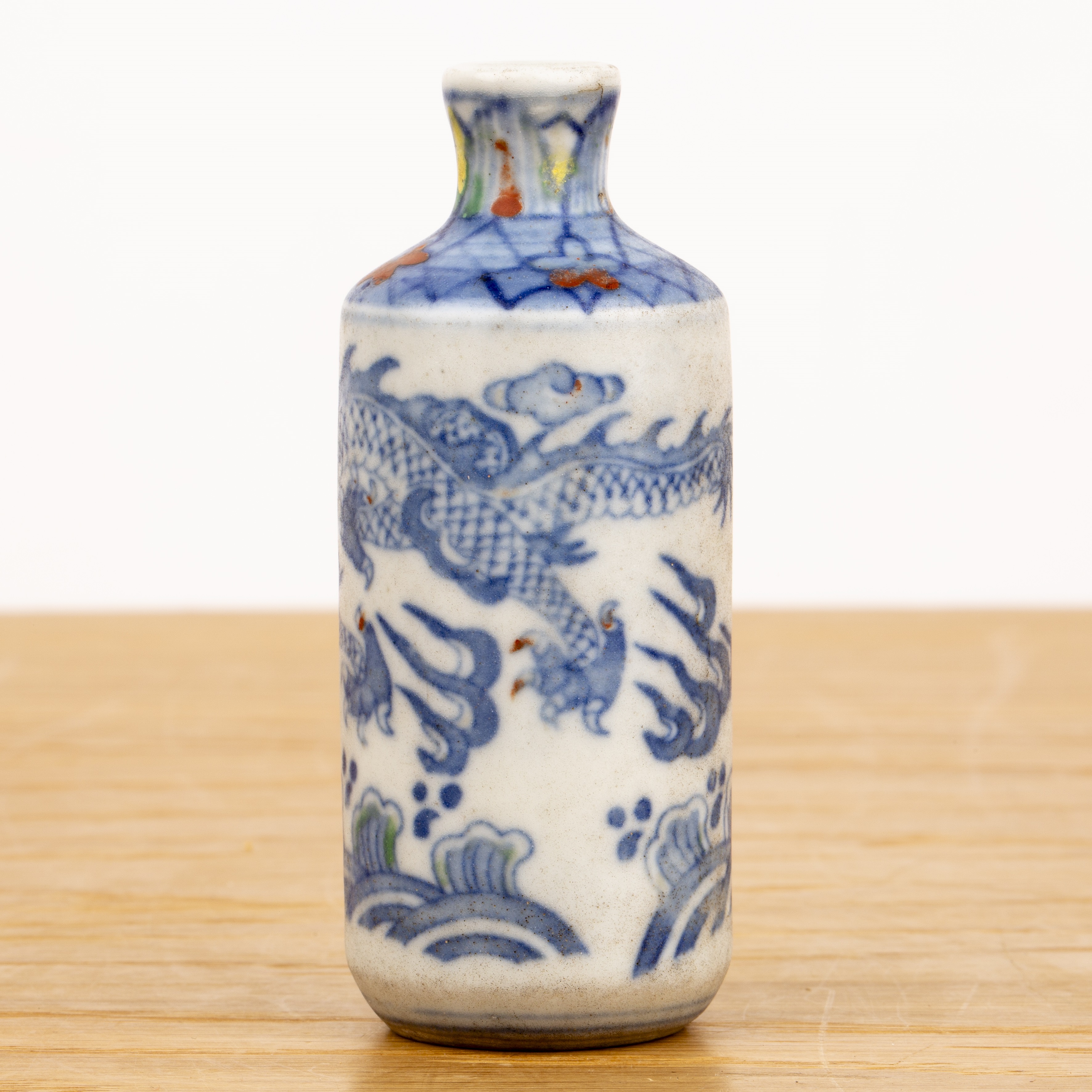 Blue and white porcelain cylindrical snuff bottle Chinese painted with a dragon and flaming - Image 2 of 3