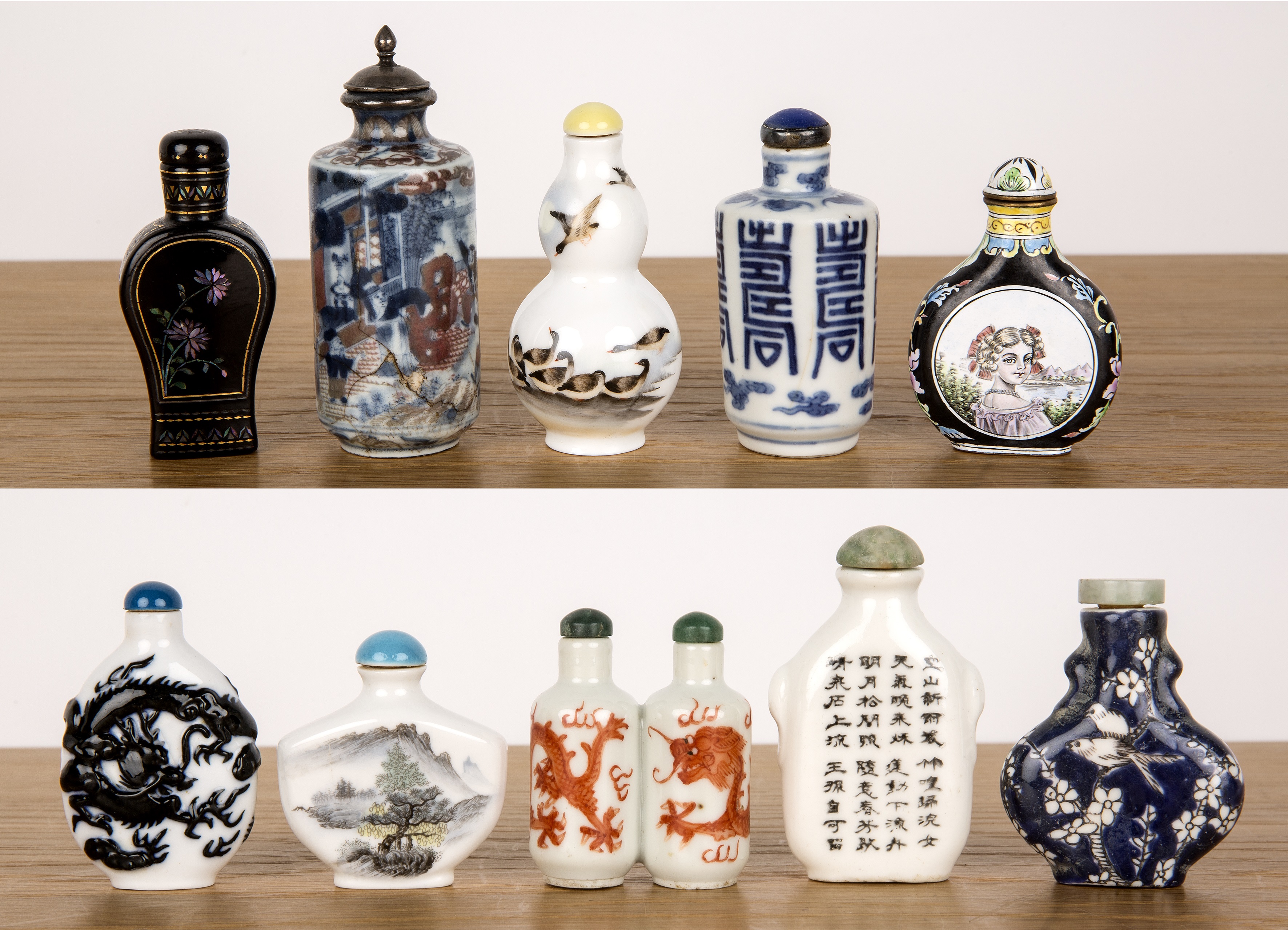 Group of ten snuff bottles Chinese, late 19th/20th Century including enamel, lacquer, and