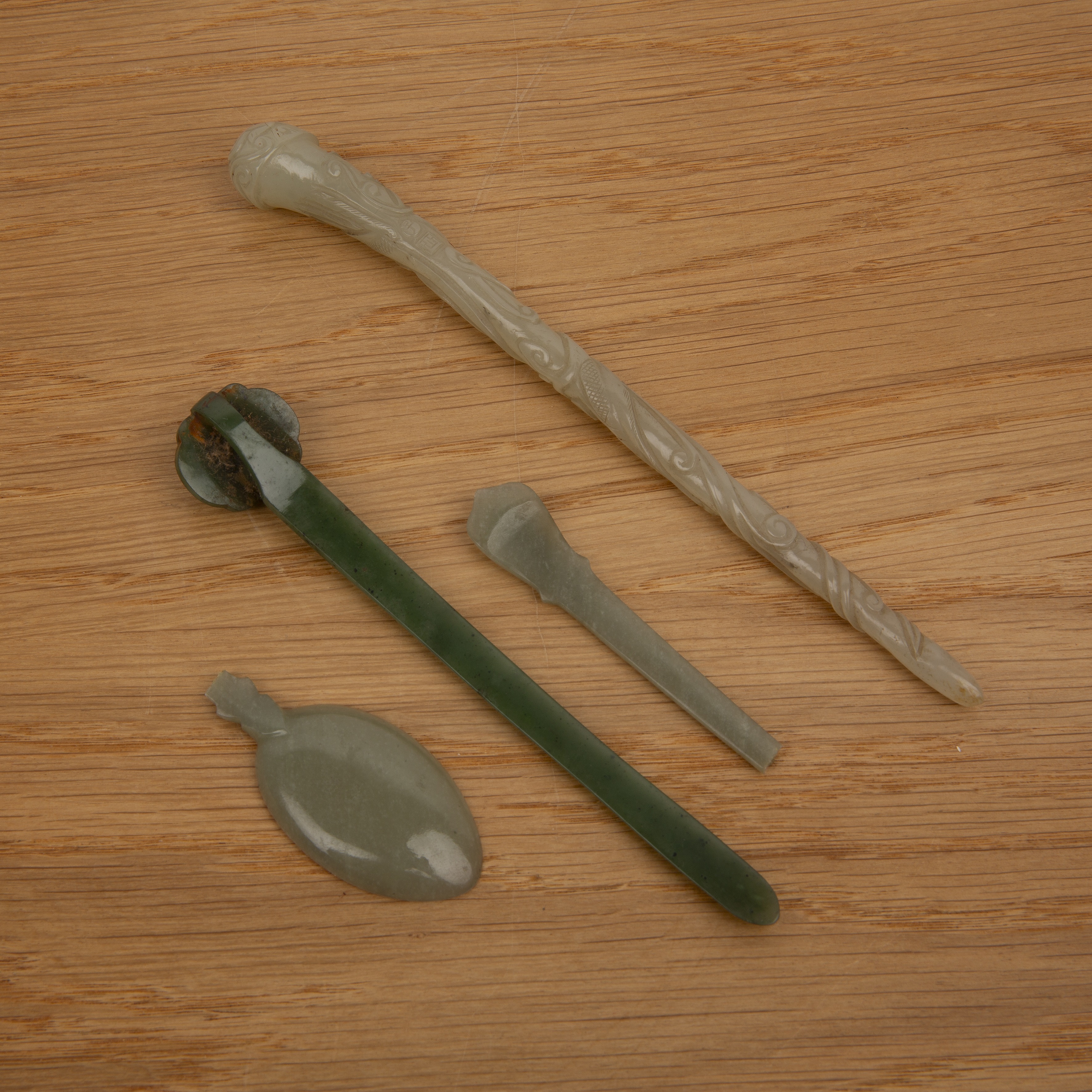 Two jade hairpins Chinese, 18th/19th Century including a pale green hairpin carved with a chi-long - Image 2 of 14