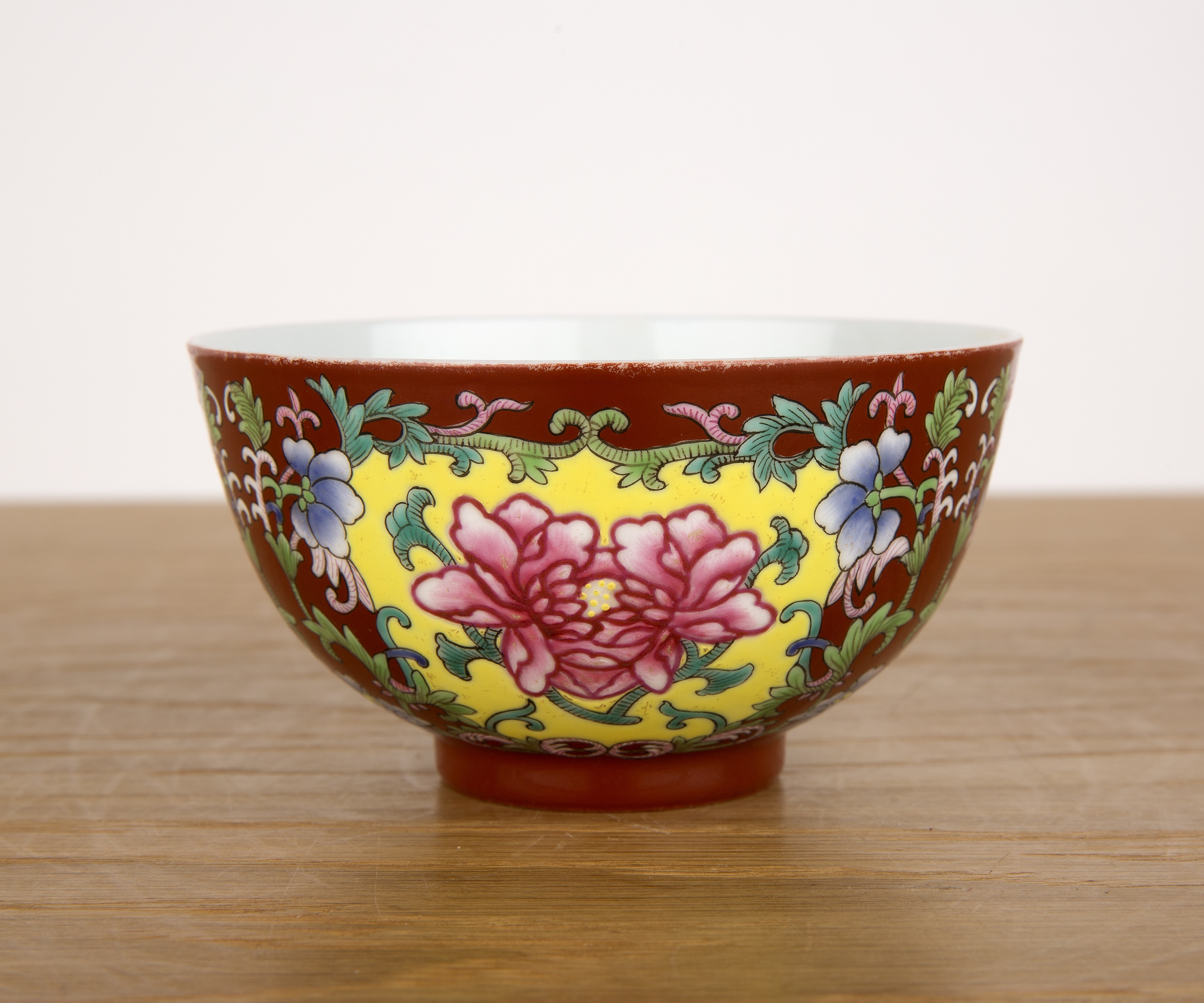 Polychrome enamelled porcelain bowl Chinese, 19th/20th Century painted with peonies and trailing