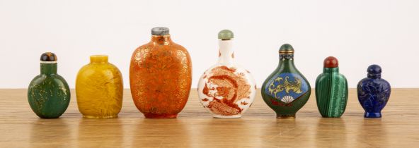Group of seven snuff bottles Chinese including porcelain, cloisonne, malachite, lapis lazuli and