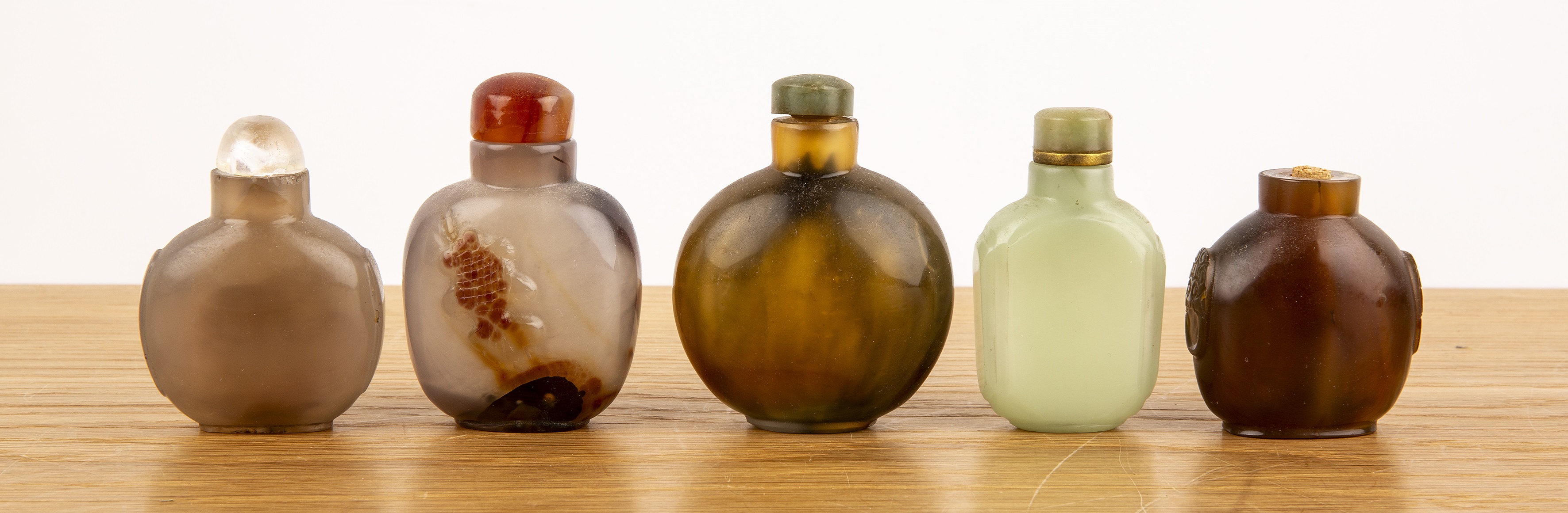 Group of five snuff bottles Chinese including an agate bottle with a raised carp, green hardstone - Image 2 of 3