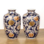 Pair of Fukagawa vases Japanese with painted peonies on an underglaze blue and gilt ground,