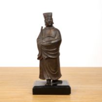 Bronze composite-filled standing guardian figure on a wood stand Chinese, late Ming the standing