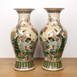 Pair of crackleware vases Chinese, 19th Century painted with peacocks and blossom, 43cm high Both