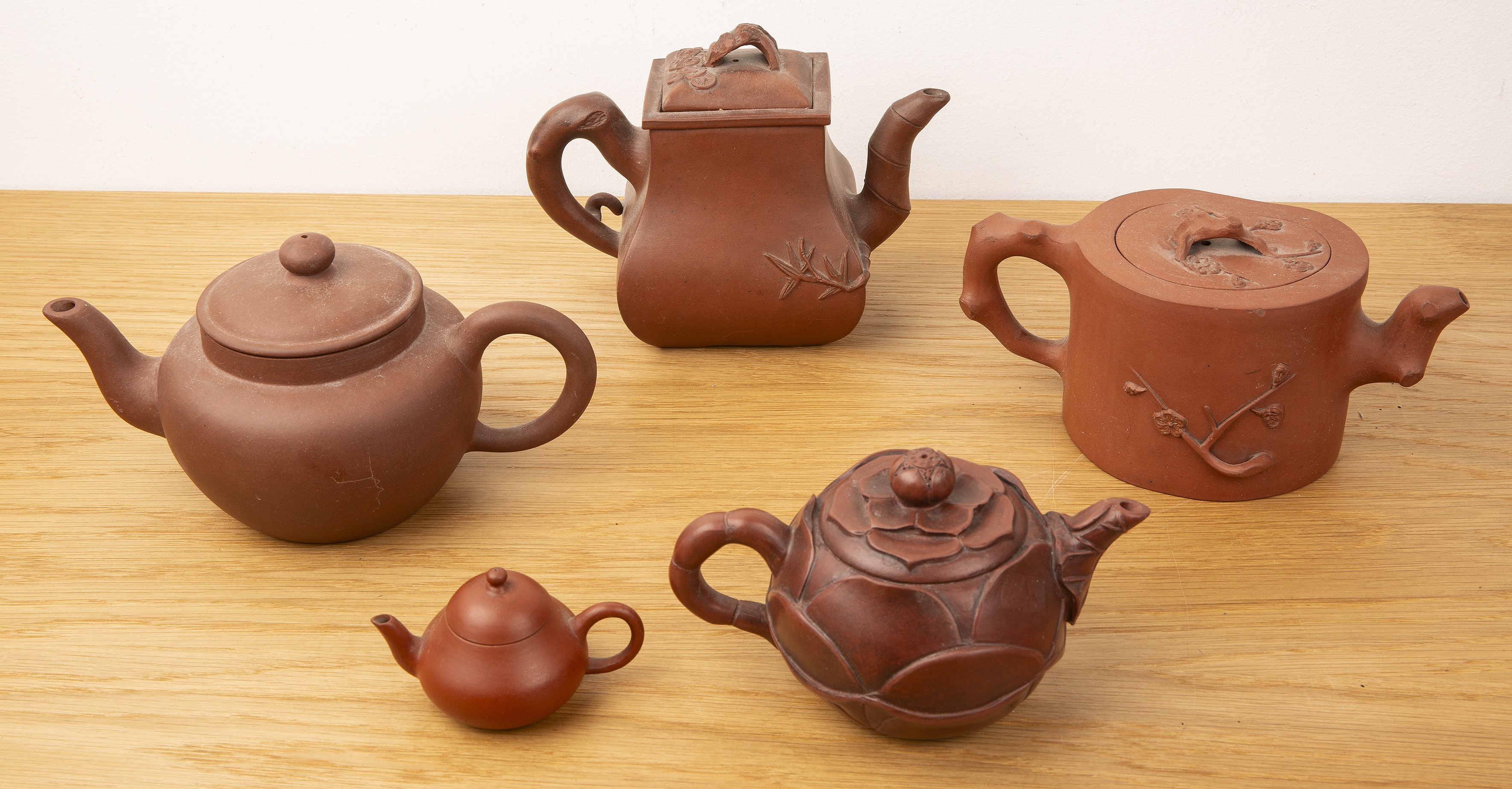 Group of five Yixing teapots Chinese, 19th/20th Century to include a rectangular teapot with moulded - Image 2 of 13