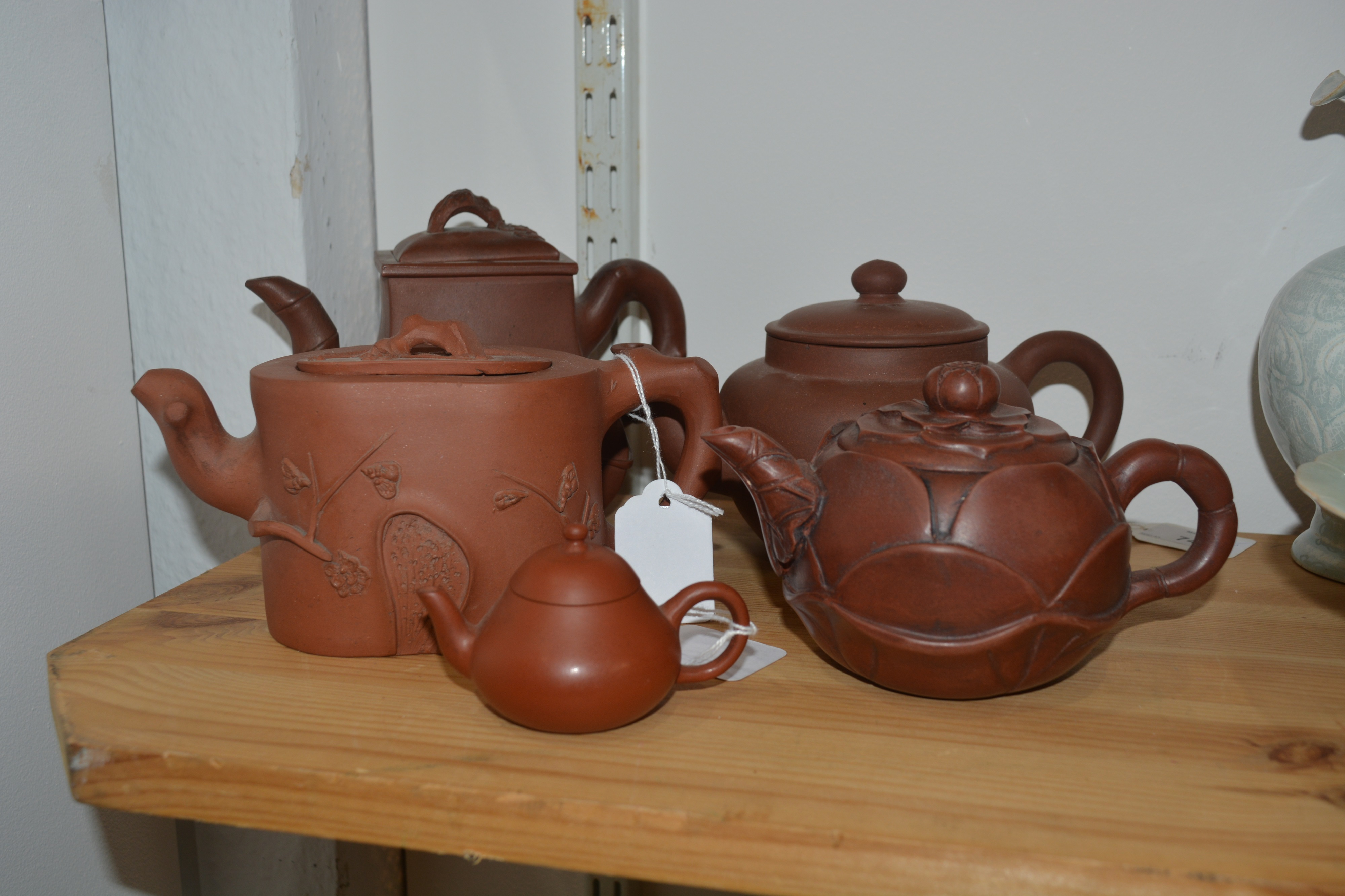 Group of five Yixing teapots Chinese, 19th/20th Century to include a rectangular teapot with moulded - Image 7 of 13