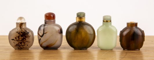 Group of five snuff bottles Chinese including an agate bottle with a raised carp, green hardstone