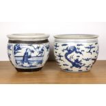 Two small blue and white fish tanks Chinese the first decorated with various panels of garden