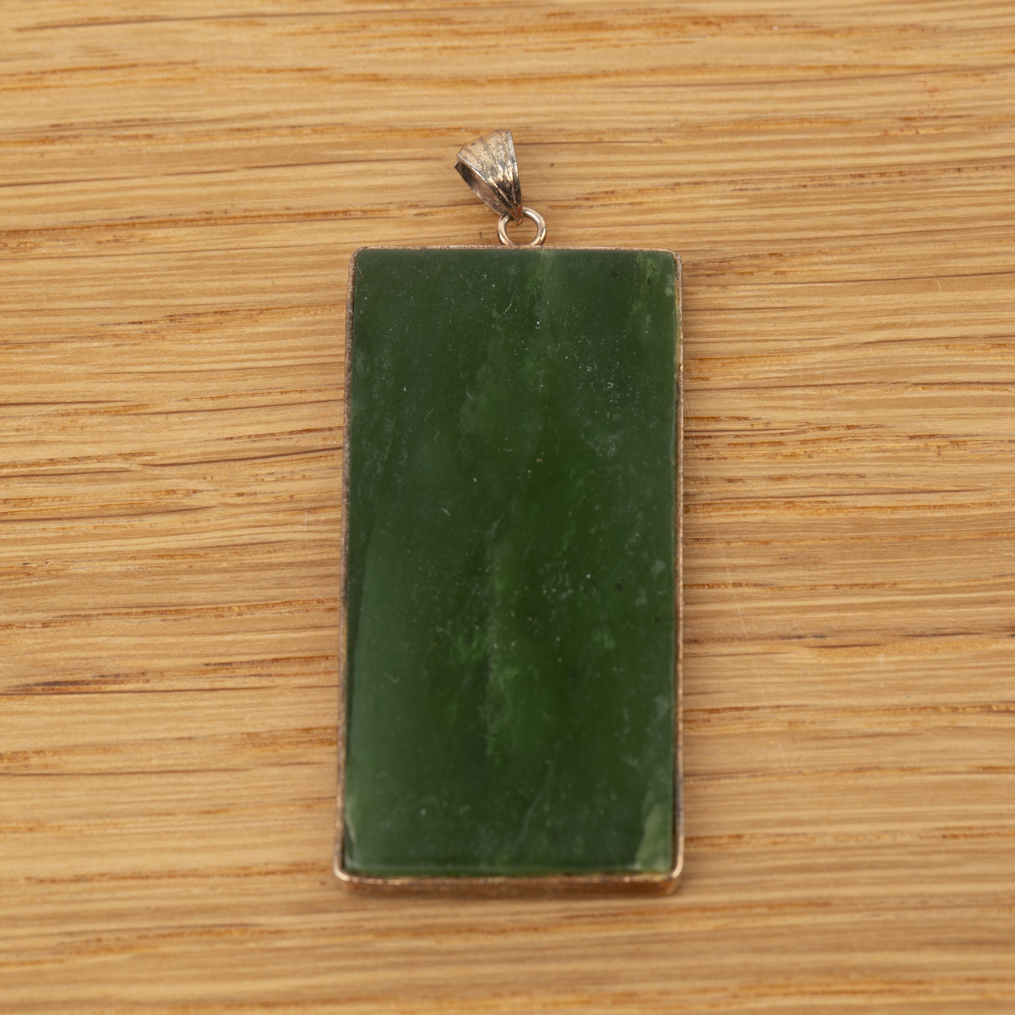 Spinach jade rectangular pendant Chinese, 20th Century with yellow metal mounts and three - Image 2 of 2