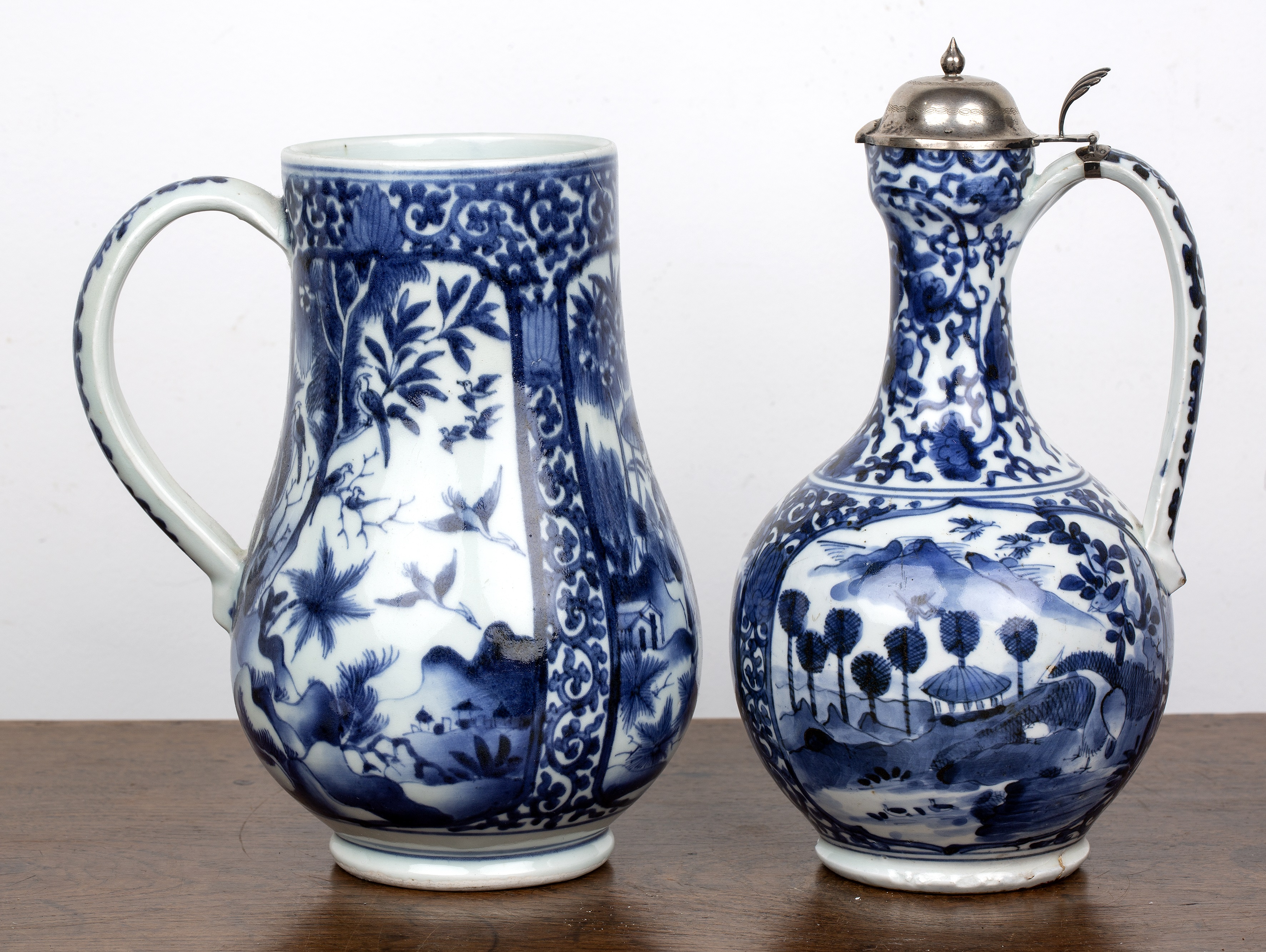 Blue and white porcelain Arita and a tankard Japanese, circa 1700 both with panels of landscape - Image 3 of 6