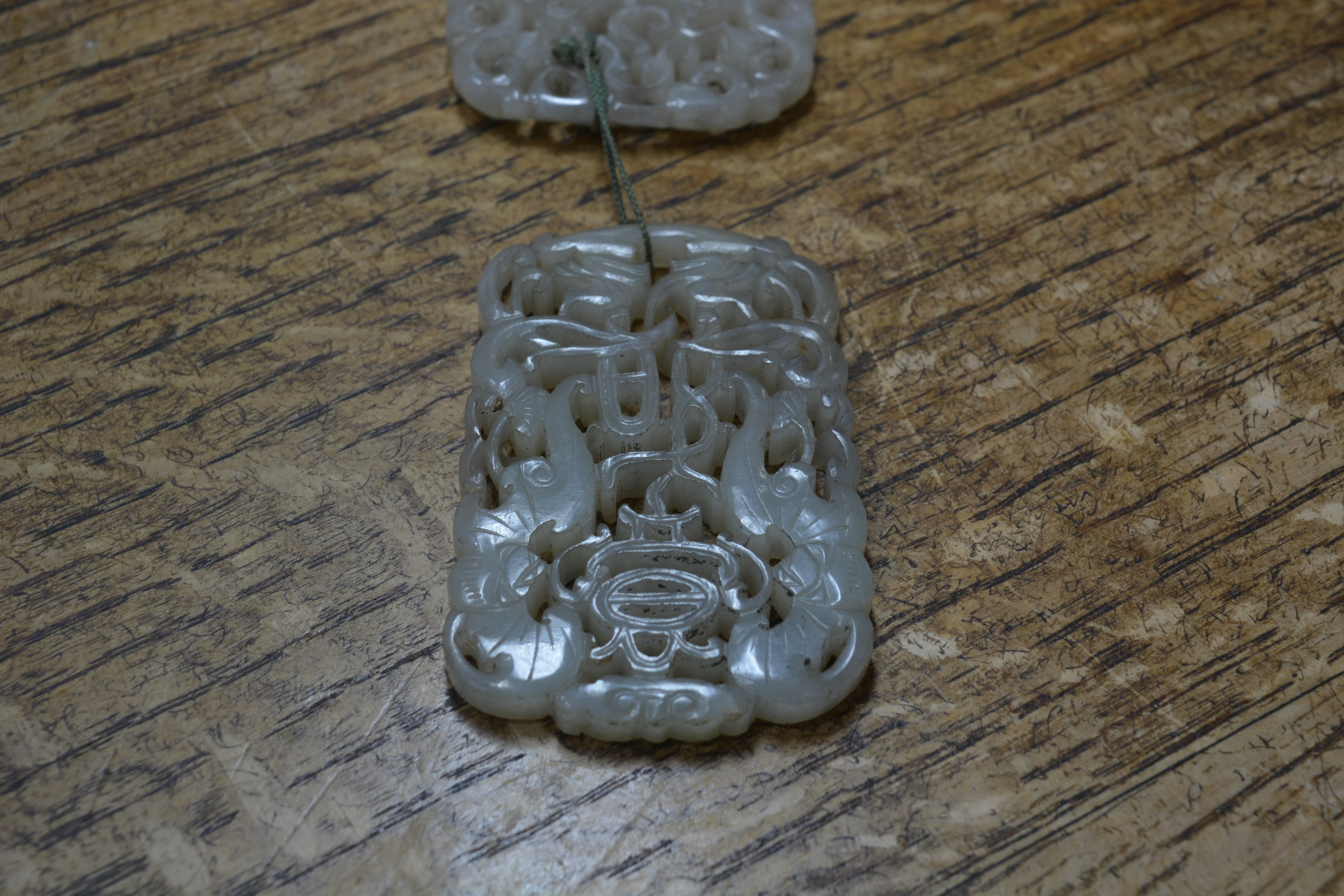 Pair of jade carved pendants Chinese, late 18th Century greyish white jade plaque pendants finely - Image 8 of 17