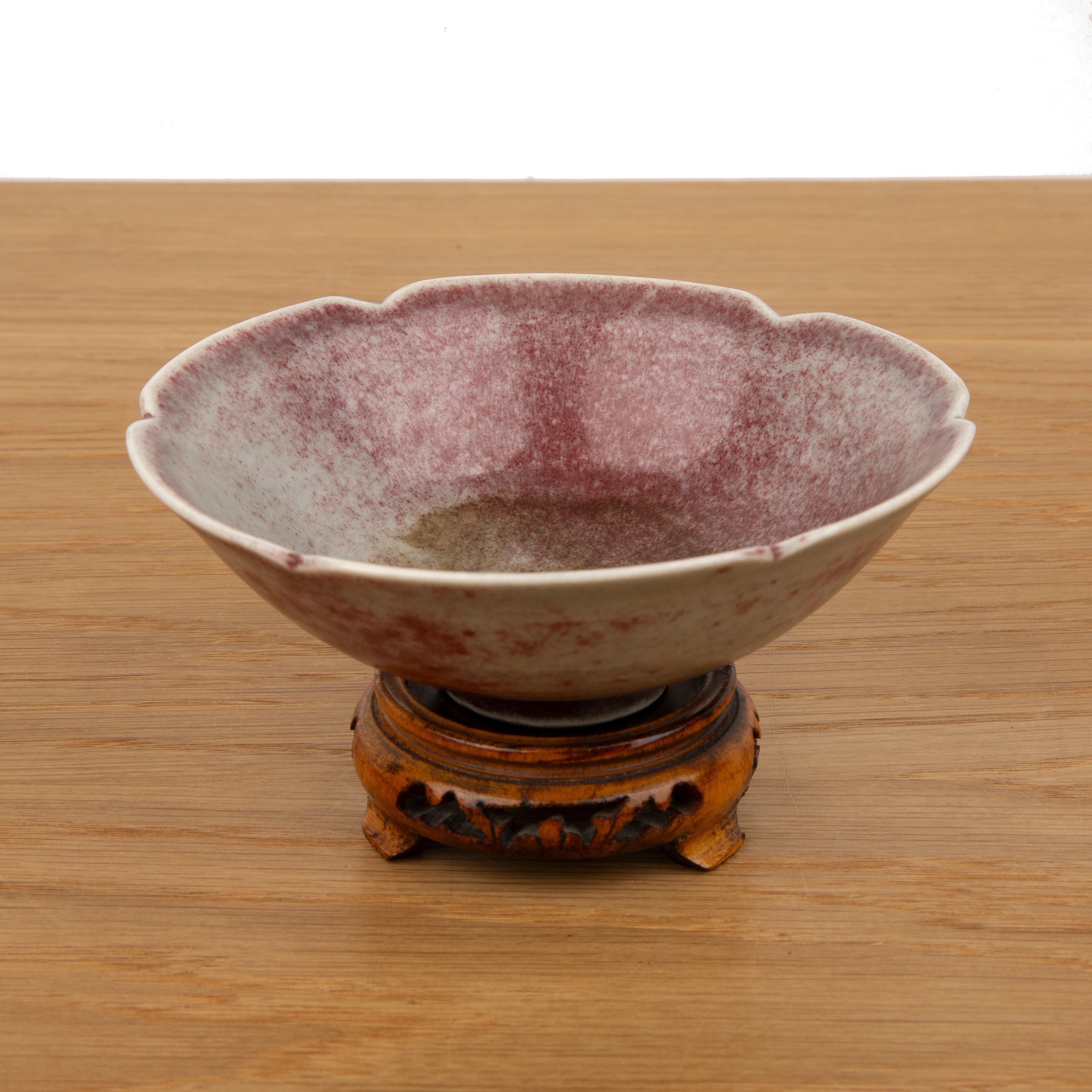Peach bloom glaze petal-shaped bowl Chinese, 18th Century with a raised foot rim, 13cm diameter x