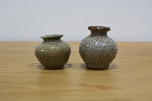 Two Guan type miniature vases Chinese, Southern Song 5.5cm high and 5cm The larger vase has some old