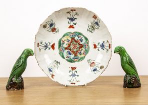 Polychrome shallow dish Chinese, Kangxi painted with a central panel and flowers around the side,