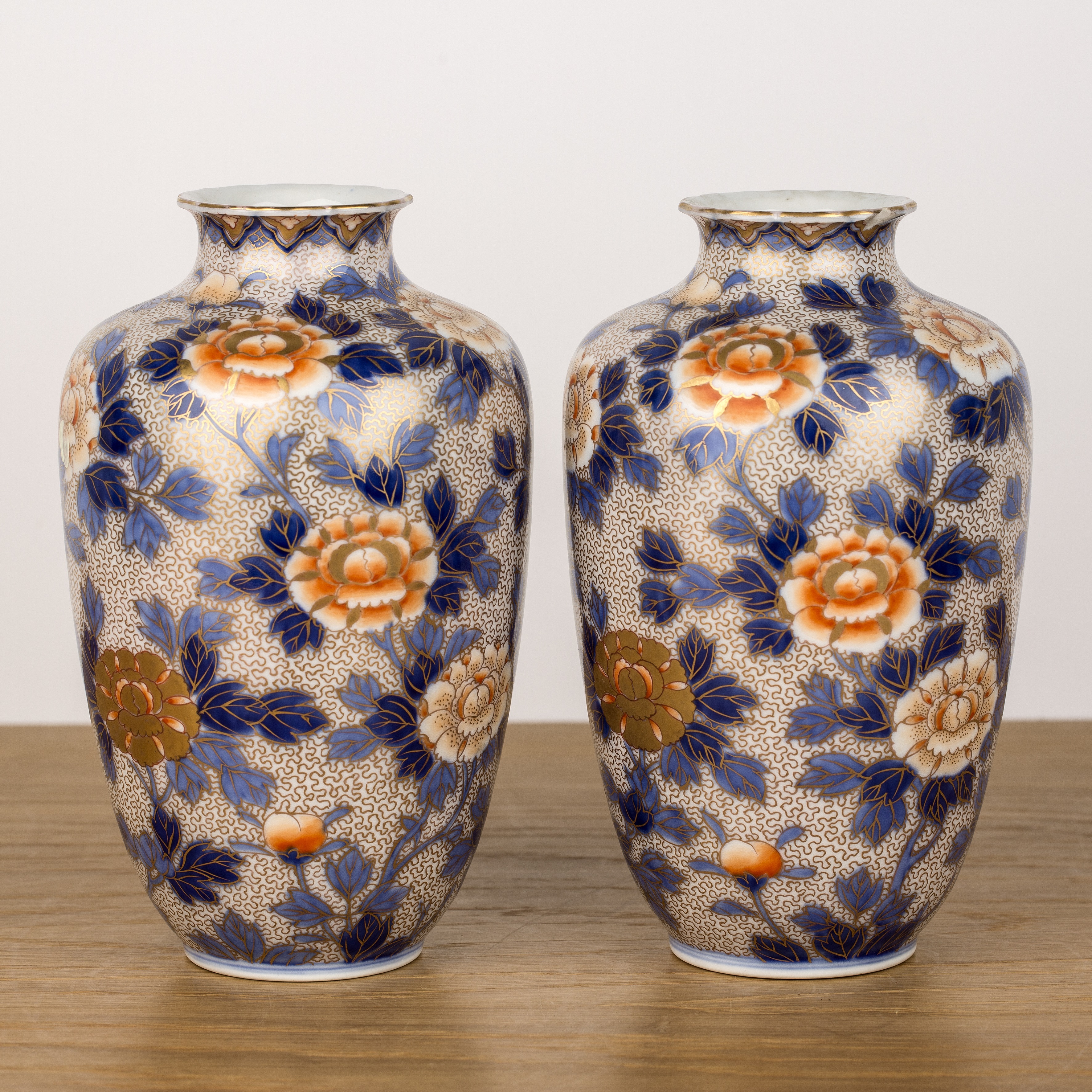 Pair of Fukagawa vases Japanese with painted peonies on an underglaze blue and gilt ground, - Image 2 of 3