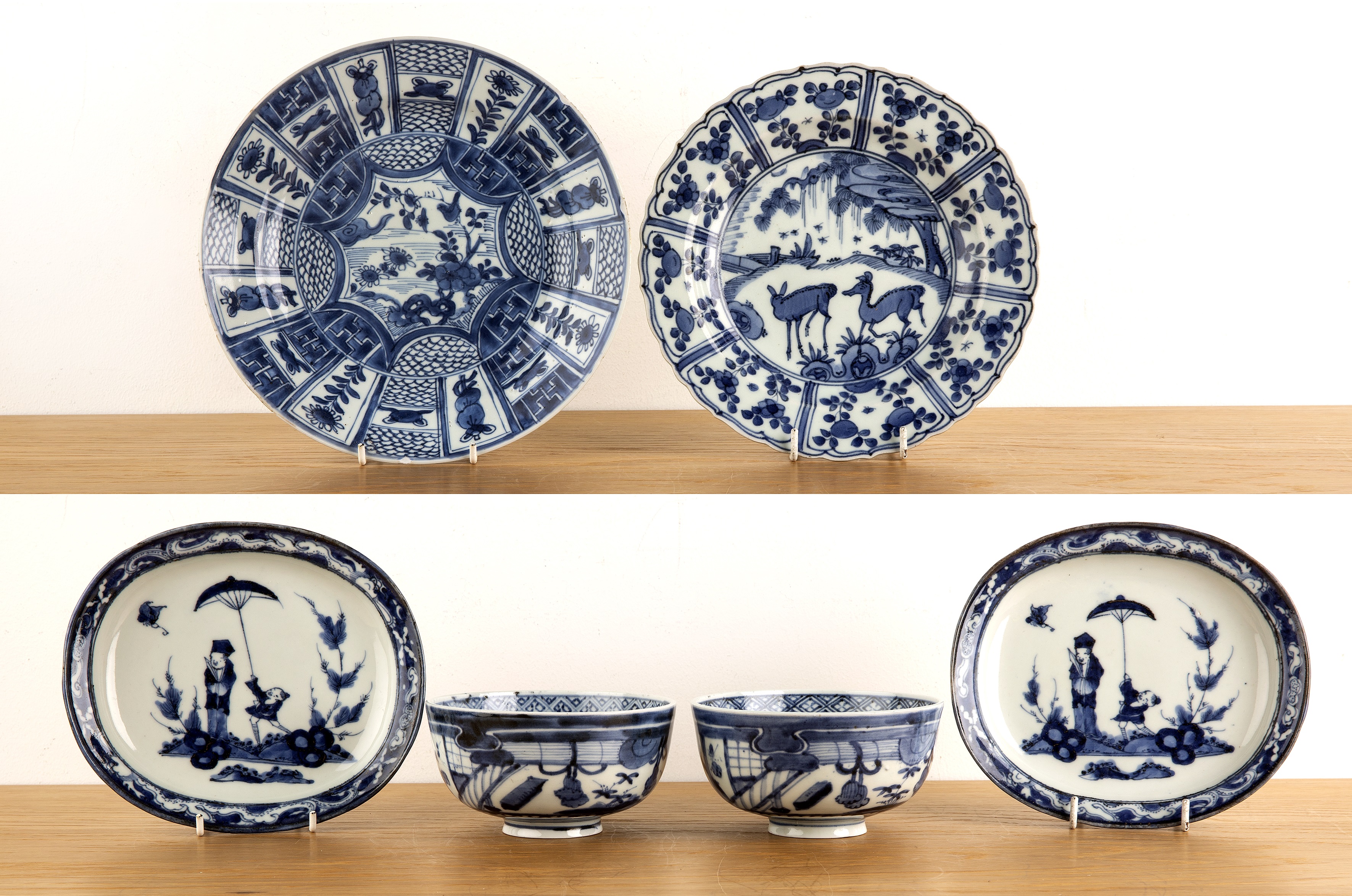 Group of porcelain pieces blue and white Chinese and Japanese to include a pair of bowls, painted