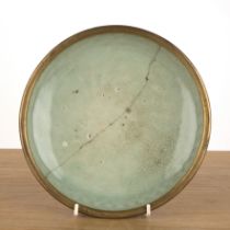 Celadon dish Chinese, Ming period with a gilt border and sang de bouef base, 24cm diameter x 5.3cm