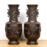 Pair of bronze vases Japanese, late 19th Century decorated with birds and mons motifs, with an
