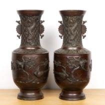 Pair of bronze vases Japanese, late 19th Century decorated with birds and mons motifs, with an