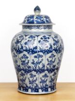 Blue and white jar and cover Chinese, Kangxi with all-over panels of flowers, within a chevron and
