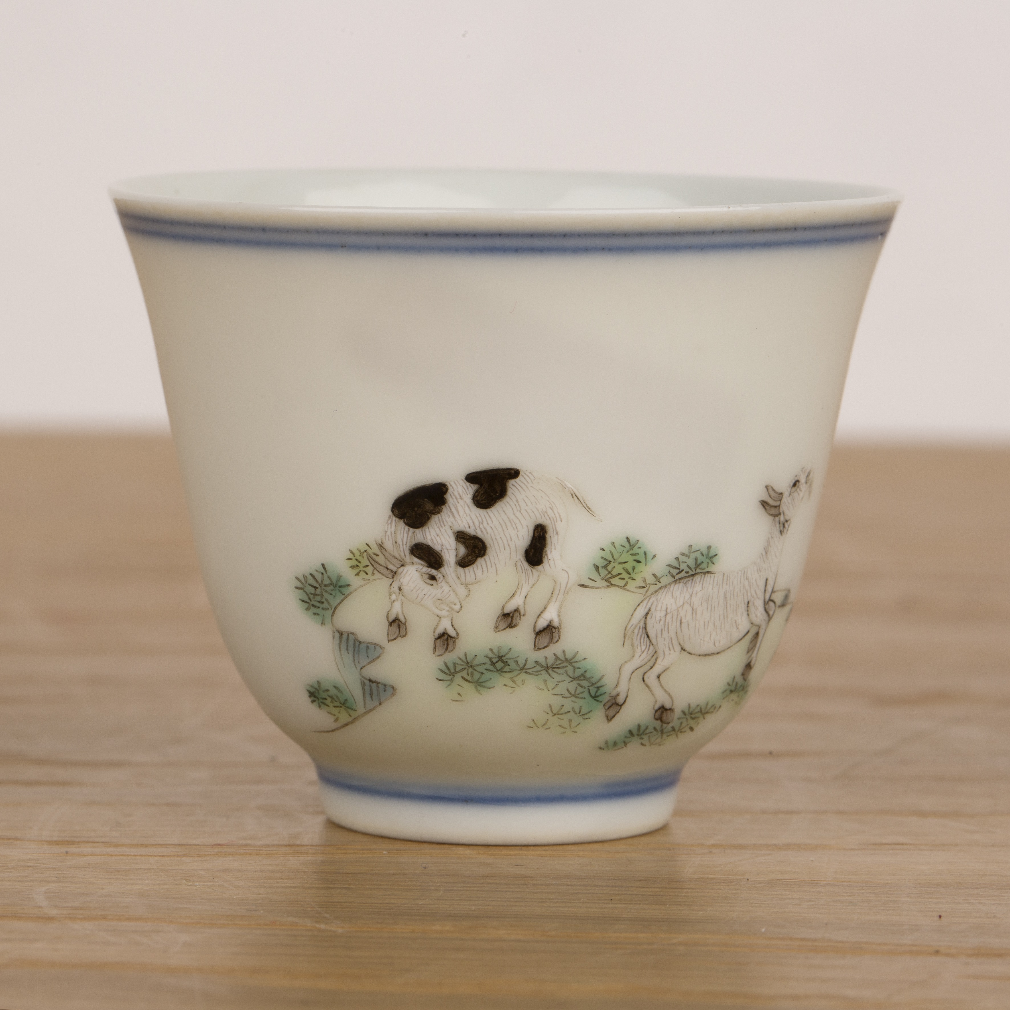 Doucai porcelain small tea bowl Chinese painted in enamels with a water buffalo being ridden by a - Image 2 of 15