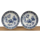 Pair of blue and white porcelain shallow dishes Chinese, Kangxi each painted with hunting scenes