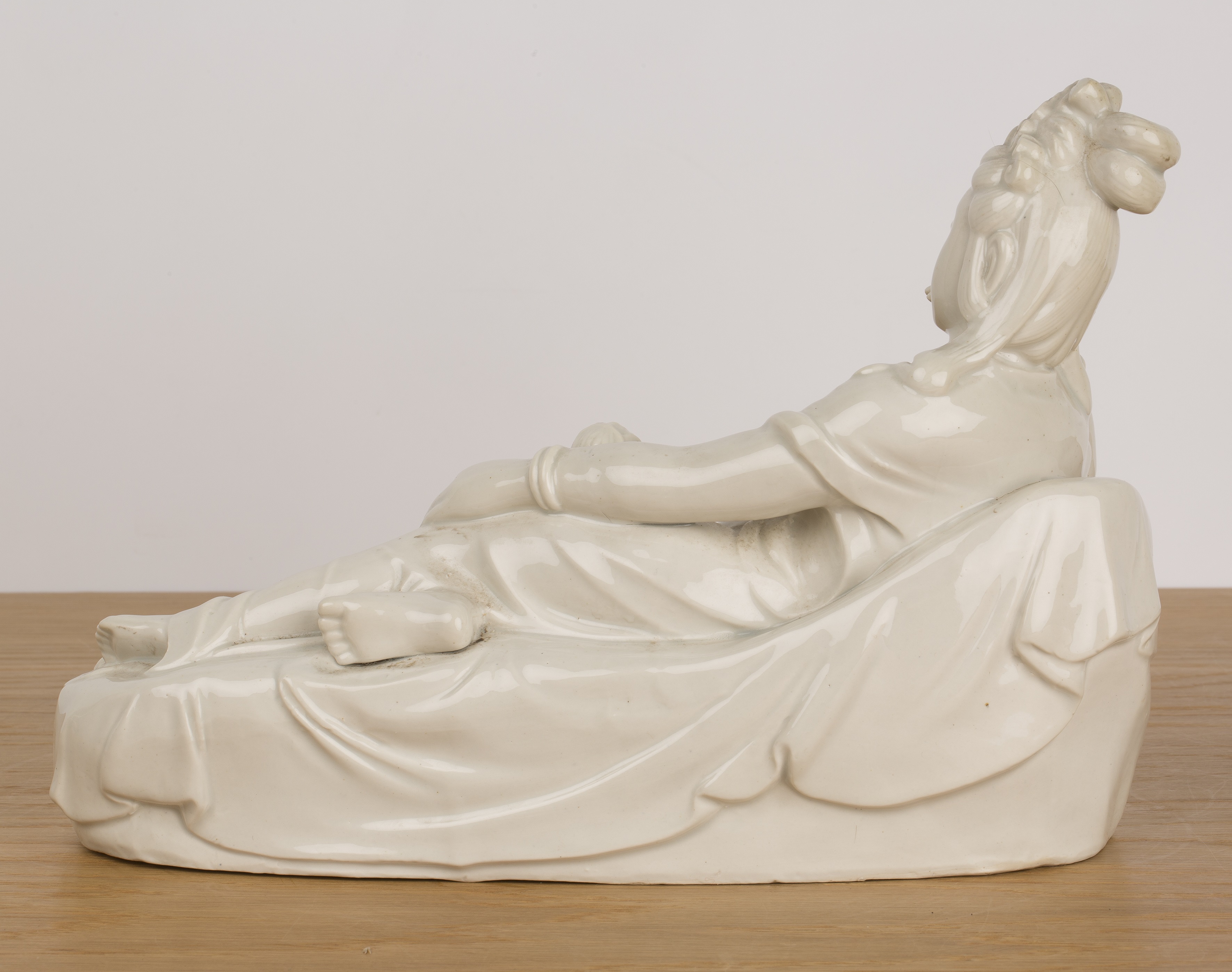 Blanc-de-chine figure of Guan Yin Chinese, early 20th Century the recumbent figure with her right - Image 2 of 3