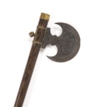 Axe with wooden handle Persian with gilt mounts and a crescent blade, the steel blade decorated with