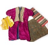 Small group of Ottoman textiles Turkish including an embroidered panel, waistcoat and other