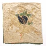 Silkwork panel Chinese ivory ground and embroidered with a qilin in flight, with gold thread
