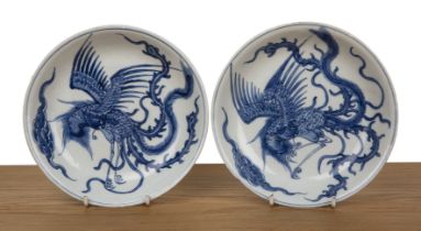 Two similar shallow blue and white dishes Chinese, Kangxi including a pair of shallow dishes painted