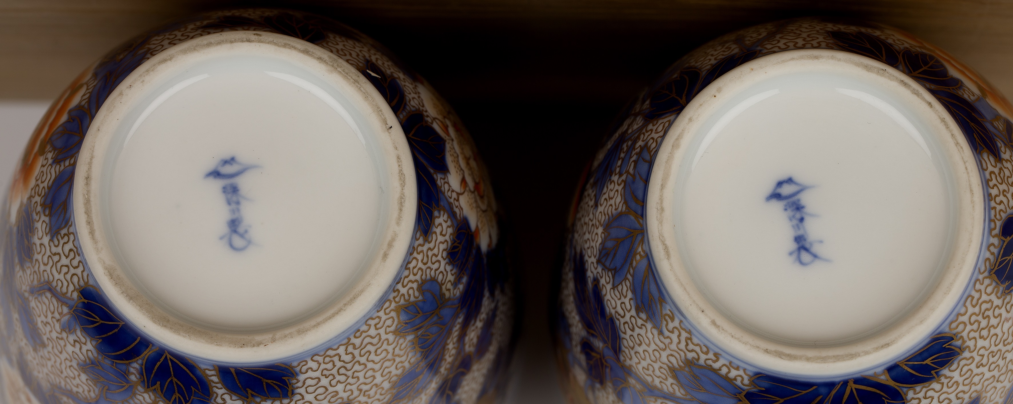 Pair of Fukagawa vases Japanese with painted peonies on an underglaze blue and gilt ground, - Image 3 of 3