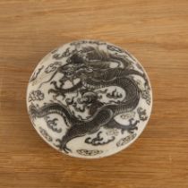 Biscuit fired monochrome ink pot and cover Chinese, 19th Century painted with a dragon and pearls
