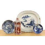 Group of four pieces Japanese including a tokkuri with panels of figures, 22cm, an oval dish with