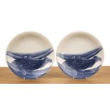 Pair of blue and white porcelain plates Japanese, 19th Century painted with carp, 21.2cm diameter (