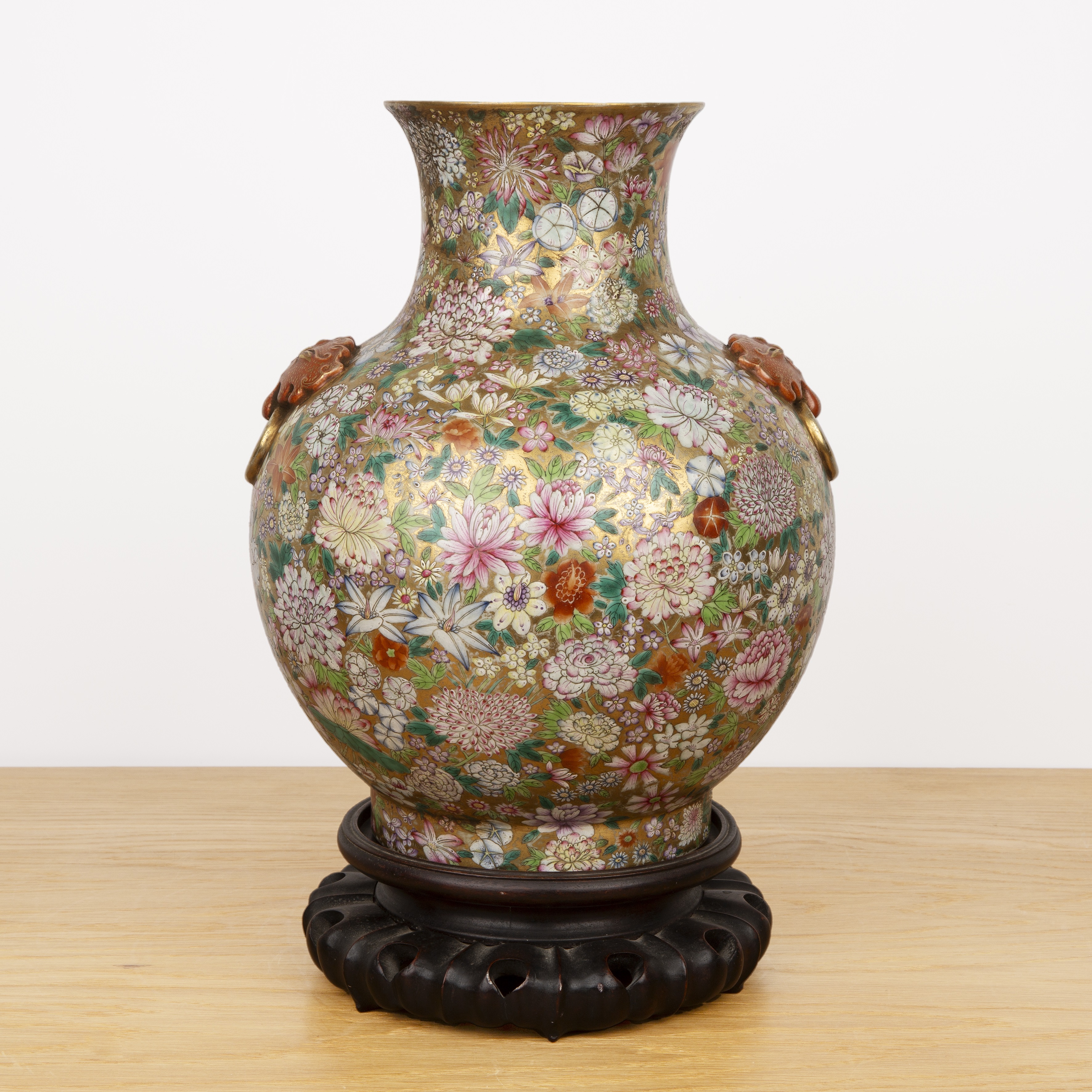 Millefleur porcelain vase and stand Chinese, circa 1900 with raised ruyi and ring handles. The