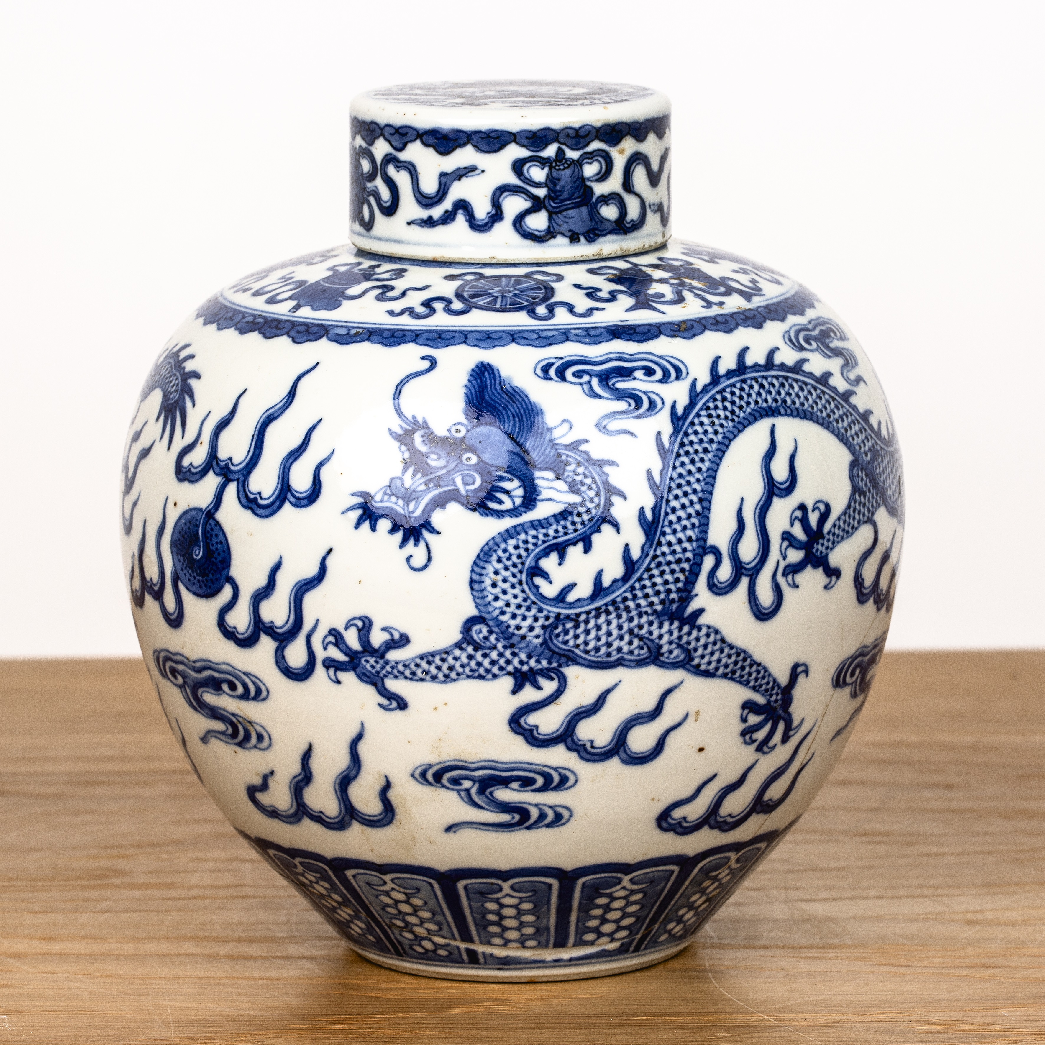 Ovoid blue and white vase and cover Chinese, 19th Century painted with a dragon and flaming - Image 2 of 4