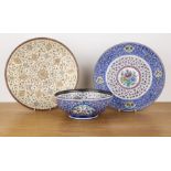 Three enamel pieces Persian, 20th Century including a bowl, 18.5cm and two similar plates, 24.5cm