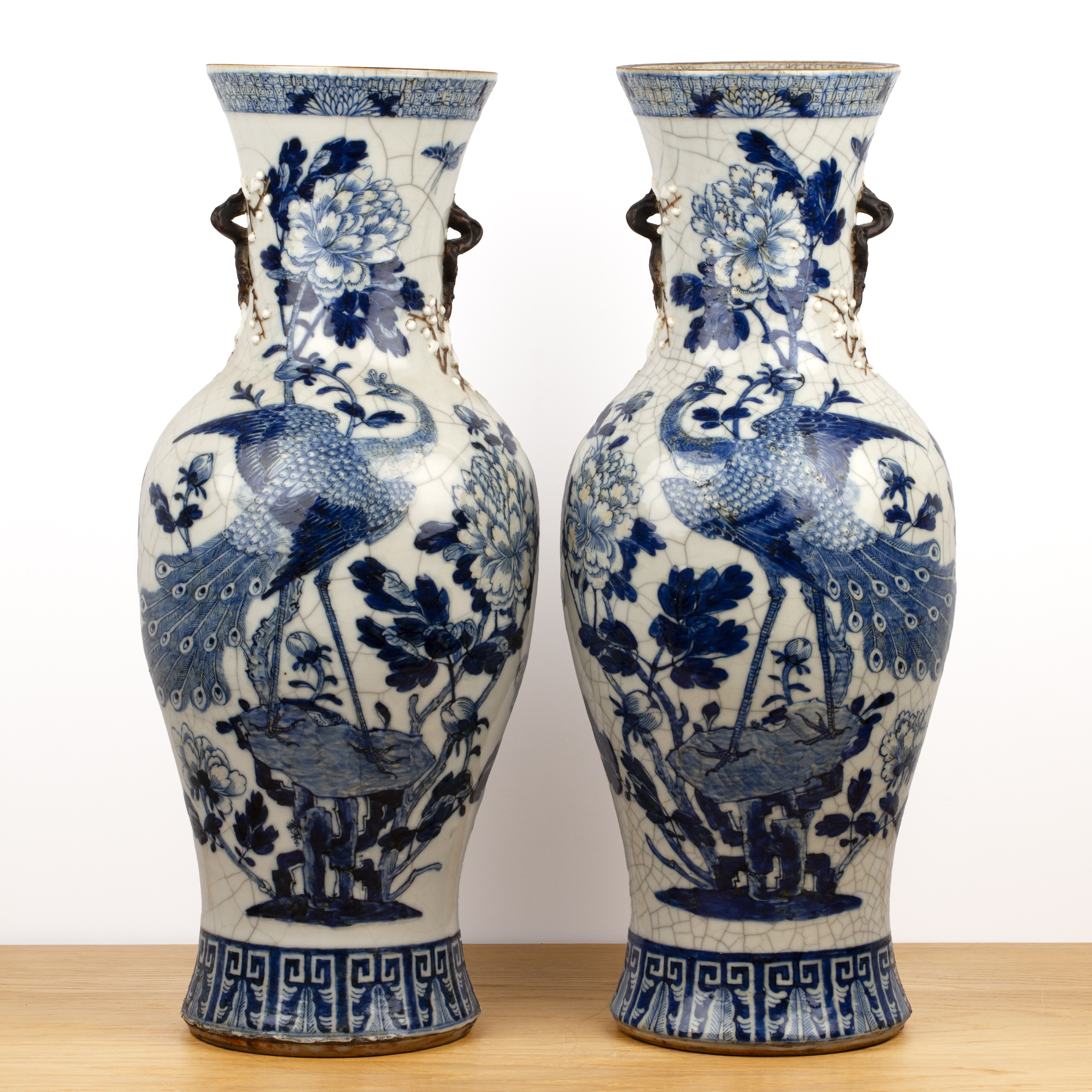Pair of crackleware vases Chinese, 19th Century with phoenix and lotus decoration, raised bocage