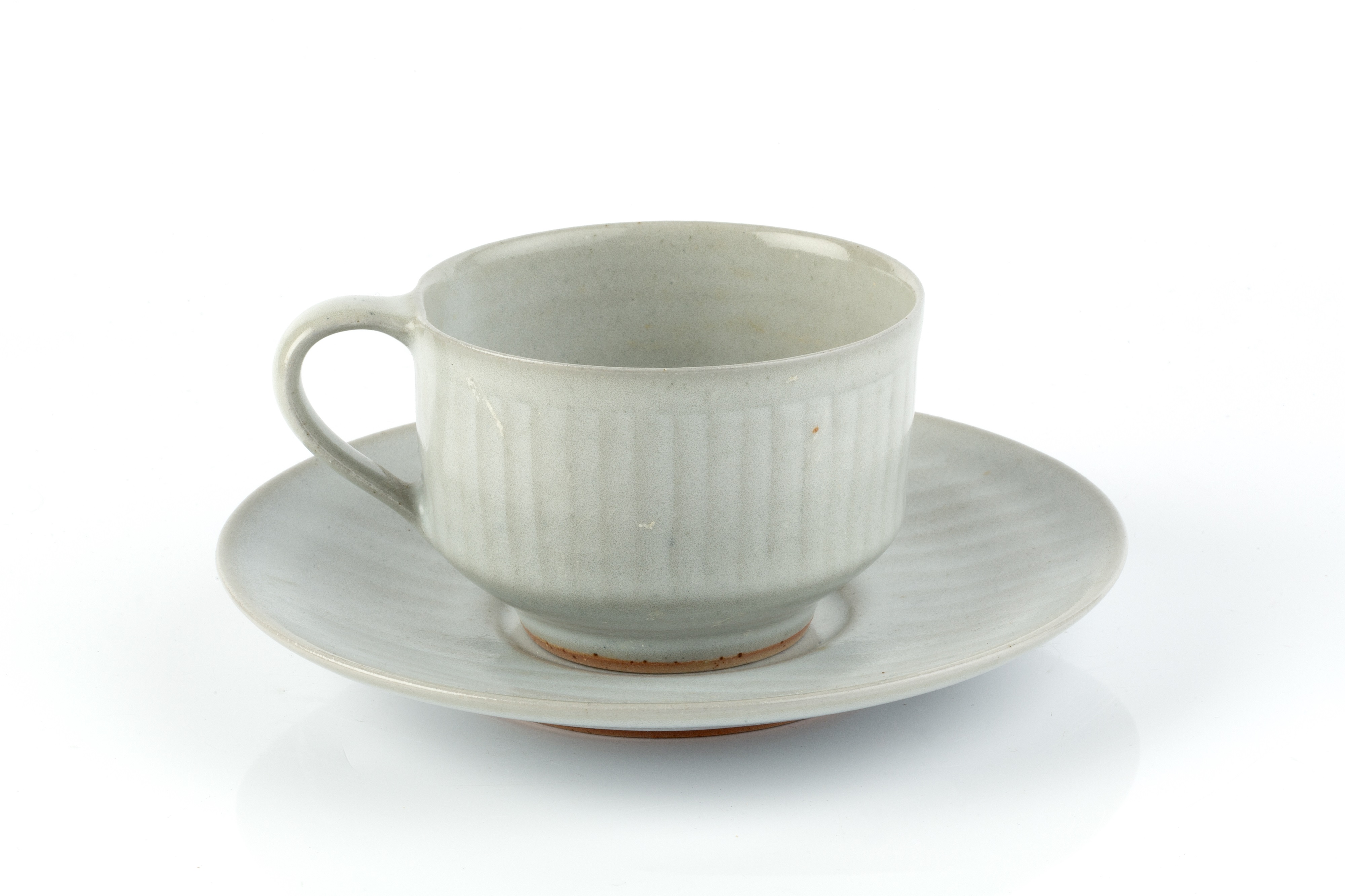 Rupert Spira (b.1960) Cup and saucer pale glaze and with a faint incised pattern both with impressed - Image 2 of 4