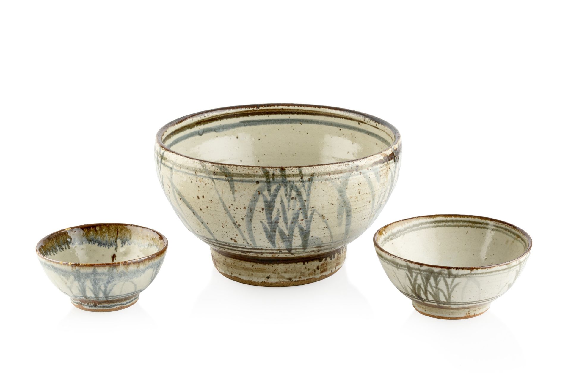 Rupert Spira (b.1960) A set of three graduated bowls stoneware, with blue brushwork on an oatmeal