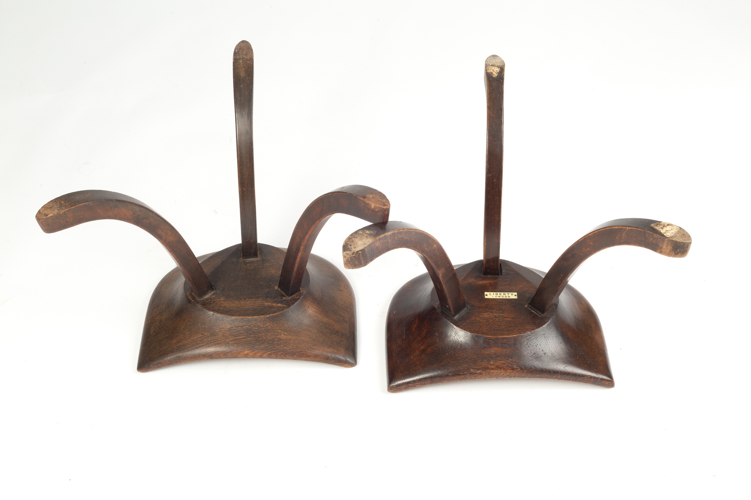 Liberty & Co. A pair of Thebes stools, circa 1910 oak, each with a dish seat over three swept legs - Image 4 of 4