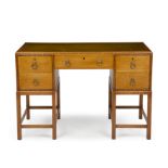 Gordon Russell (1892-1980) Cotswold School desk, circa 1920 oak with inset leather top 76cm high,