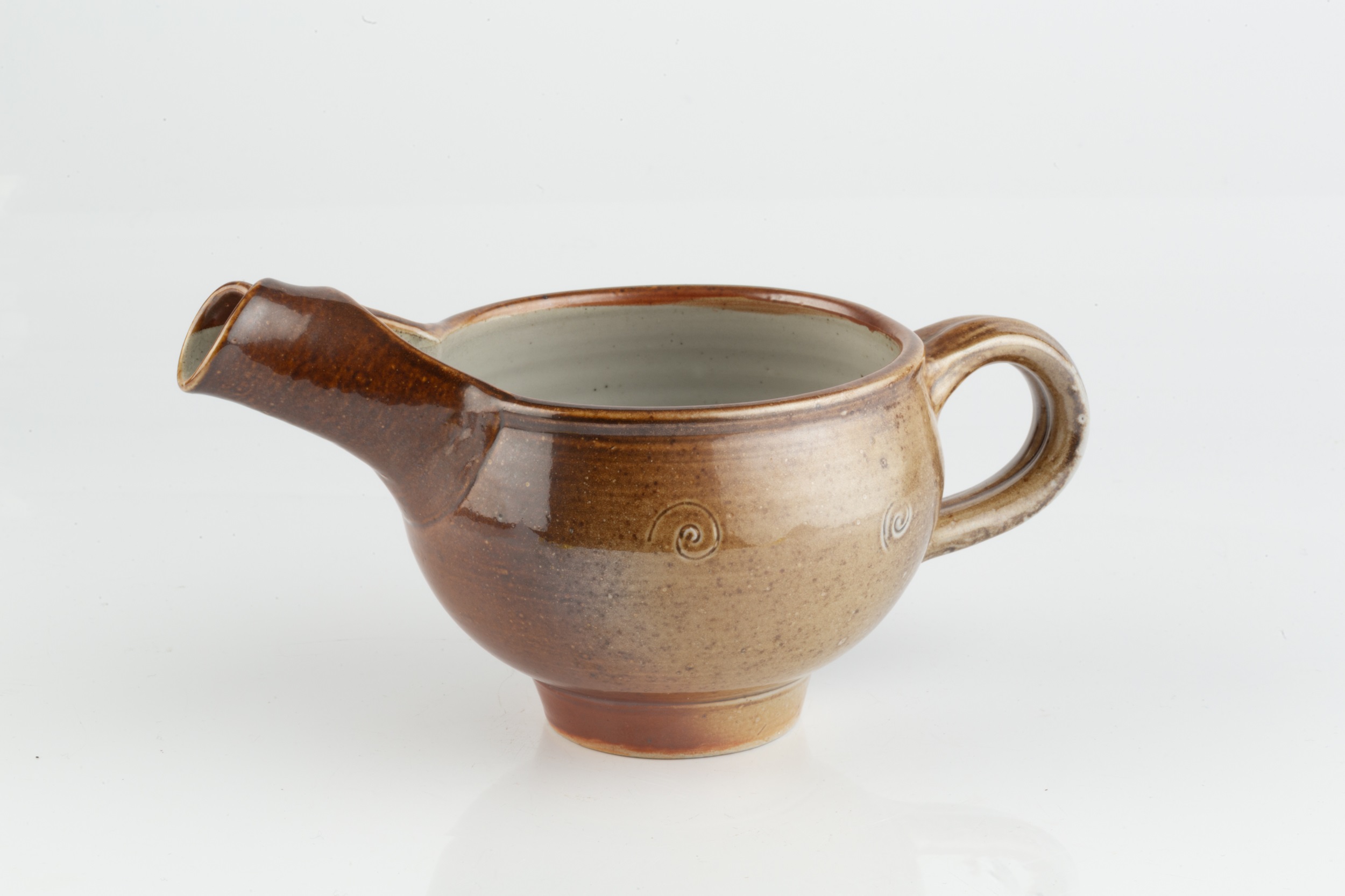 Sheila Casson (b.1930) Footed jug salt glaze and spiral motifs impressed potter's seal 12cm high, - Image 2 of 3