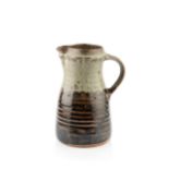 Richard Batterham (1936-2021) Jug tenmoku with grey ash glaze to handle and the top half 24cm