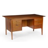 Gordon Russell desk 76cm high, 152cm wide. Stains to upper internal drawers. Key present. Stable and