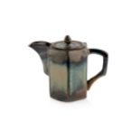 Abdo Nagi (1941-2001) Teapot stoneware, hexagonal form with mottled blue and khaki glaze 21cm high.